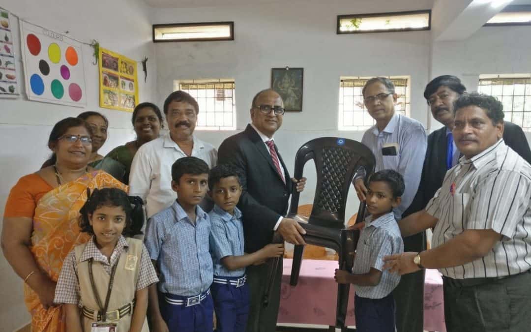 Donation of Chairs to School